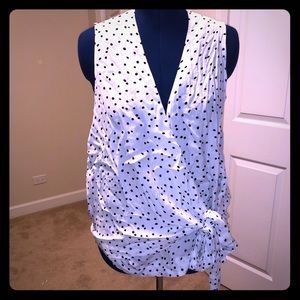 Sleeveless blouse black and white polka dots
